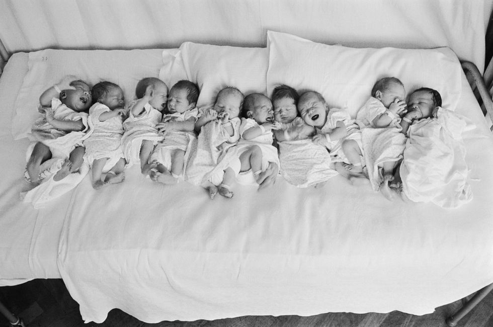 Babies on bed | ELLE UK