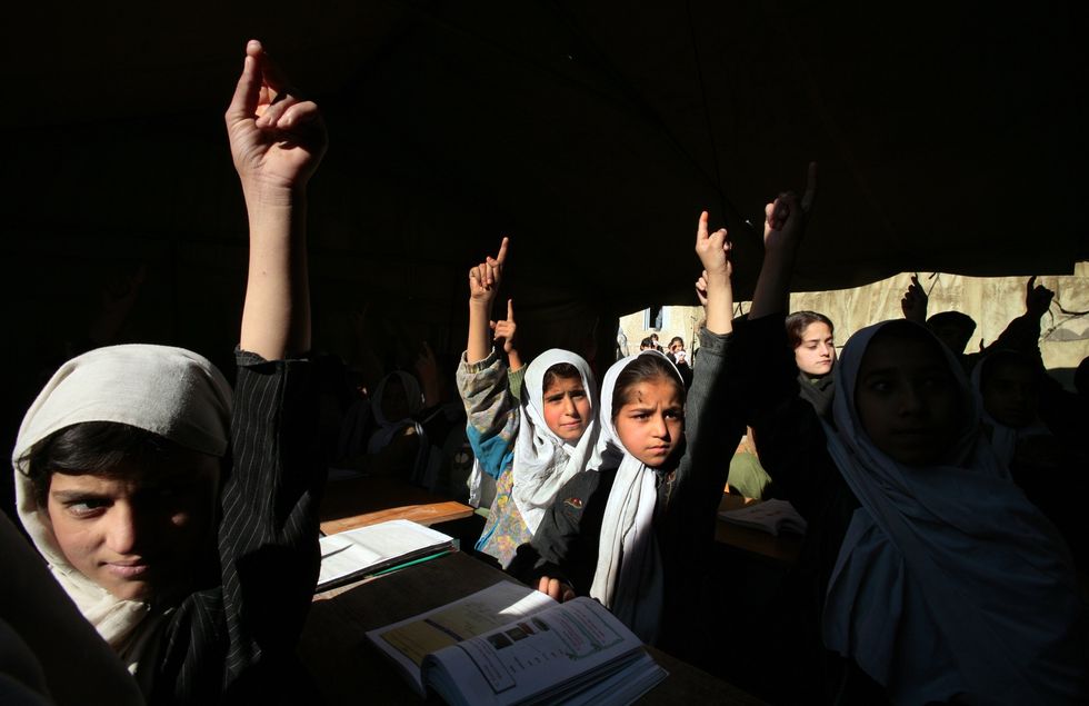 Afghan girls in school | ELLE UK
