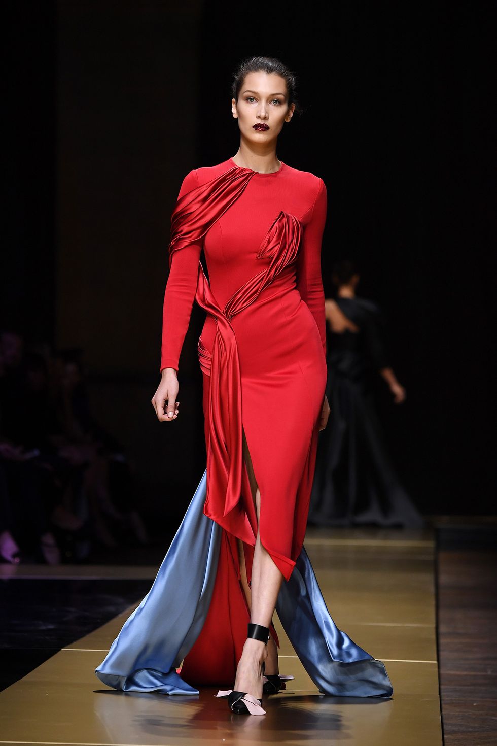 Clothing, Fashion show, Shoulder, Joint, Red, Fashion model, Runway, Formal wear, Style, Waist, 