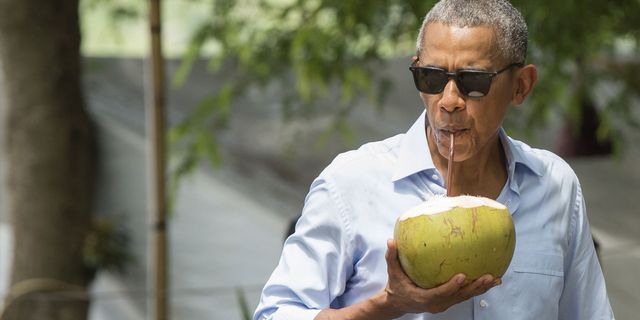 Barack Obama sipping on a coconut | ELLE UK