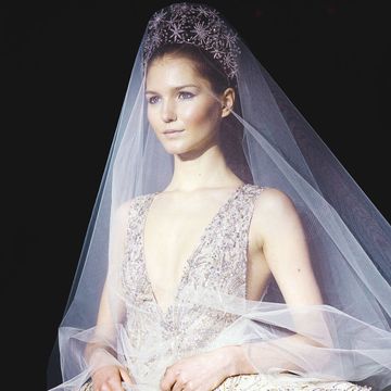 Clothing, Bridal veil, Veil, Hairstyle, Bridal clothing, Forehead, Eyebrow, Bridal accessory, Photograph, Wedding dress, 