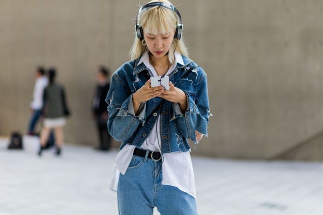 model wearing headphones music street style