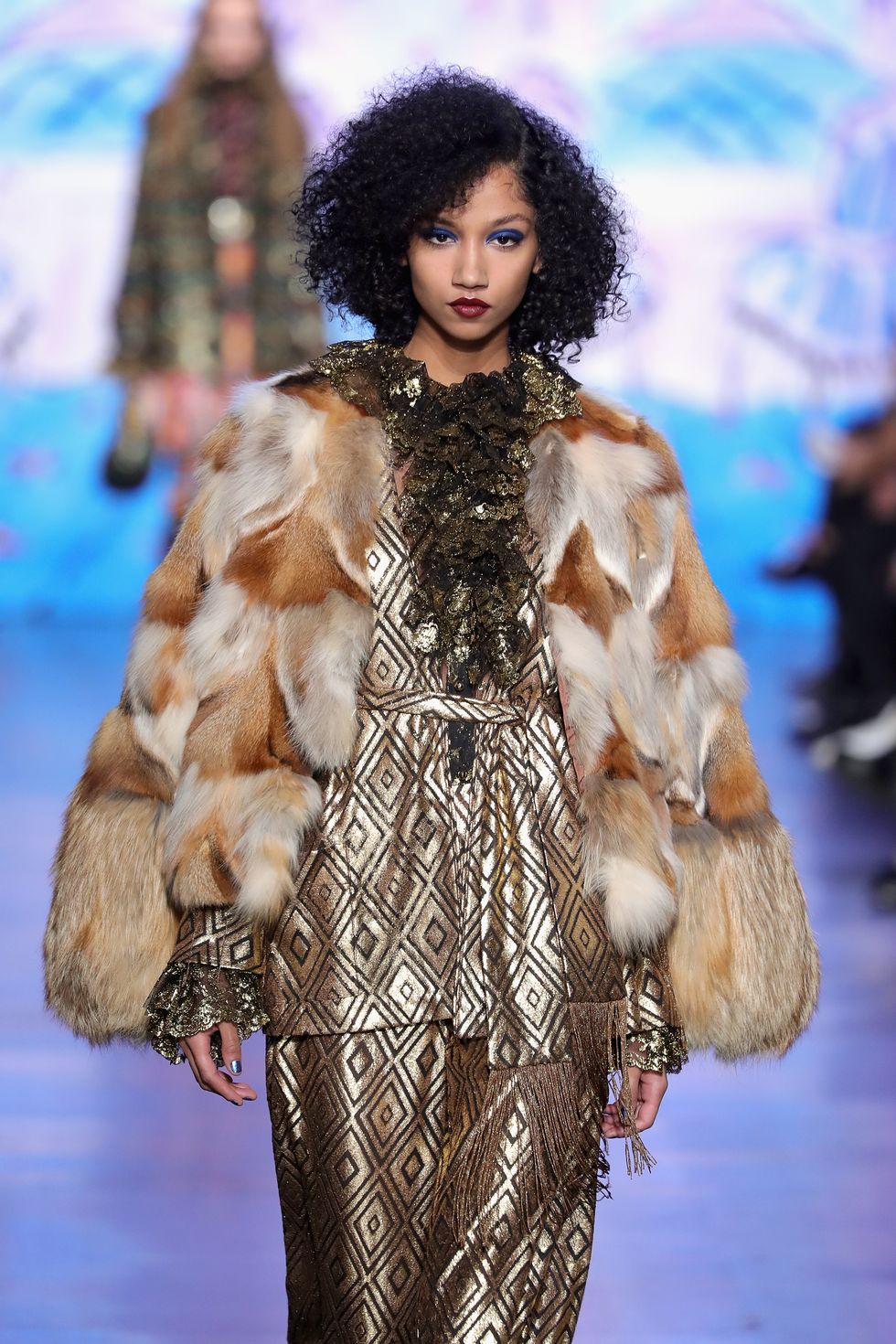 Skin, Winter, Fashion show, Textile, Fur clothing, Outerwear, Style, Fashion model, Jheri curl, Natural material, 