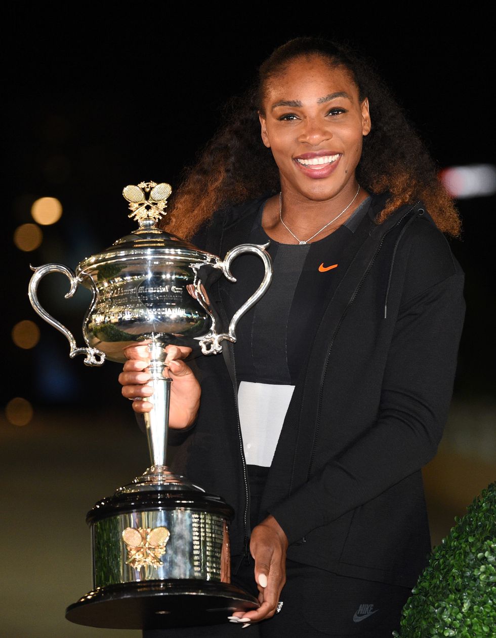 Serena Williams with Australian Open trophy | ELLE UK