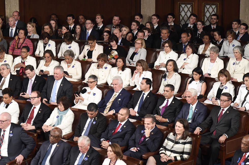 democrat women wearing white to Trump addressing nation