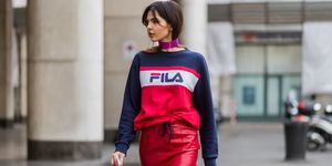 Doina Ciobanu wearing a Fila sweater at Milan Fashion Week