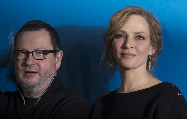 Danish director Lars von Trier (L) and US actress Uma Thurman pose at the photocall for the film 'Nymphomaniac Volume I (Long Version)' at the 64th Berlinale Film Festival in Berlin on February 9, 2014. The 64th Berlinale, the first major European film festival of the year, with 24 international productions screening in the main showcase takes place until Febuary 16, 2014. AFP PHOTO / JOHANNES EISELE (Photo credit should read JOHANNES EISELE/AFP/Getty Images)
