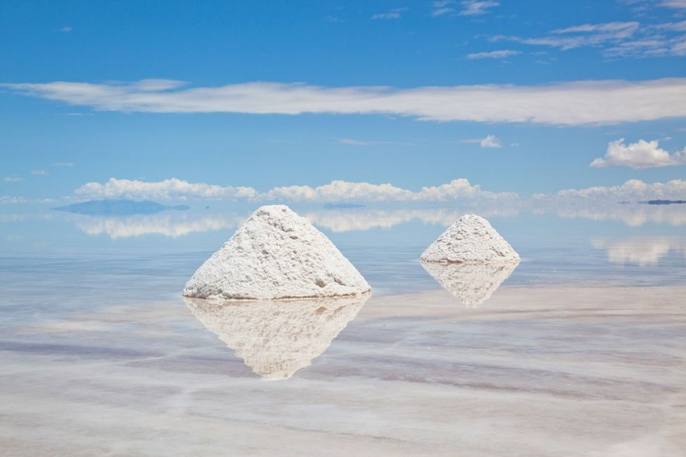 <p>This surreal salt flat is the world's largest, with 4,500 square miles of land, salt mounds and the occasional wild ostrich spotting. Found in southwestern Bolivia, the reflective <a href="http://www.latimes.com/travel/la-tr-d-bolivia-salt-flat-20151213-story.html" target="_blank">Salar</a> is known for causing optical illusions that make tiles of salt seem endless and the sky seem underfoot. </p>