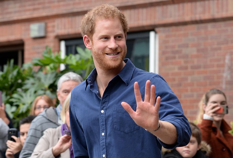 Prince Harry waving | ELLE UK