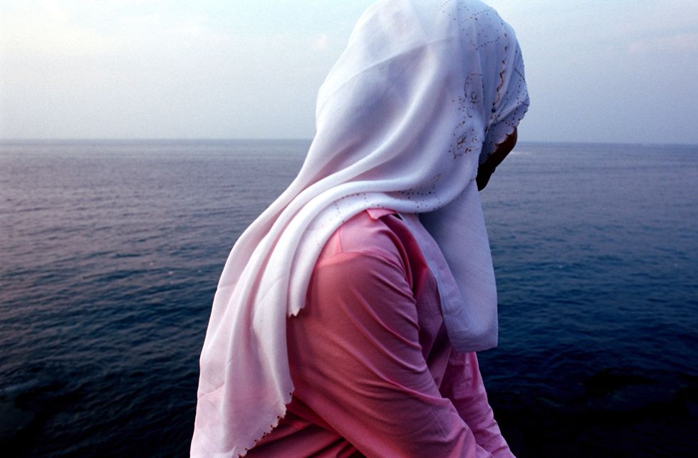 woman alone at sea | ELLE UK