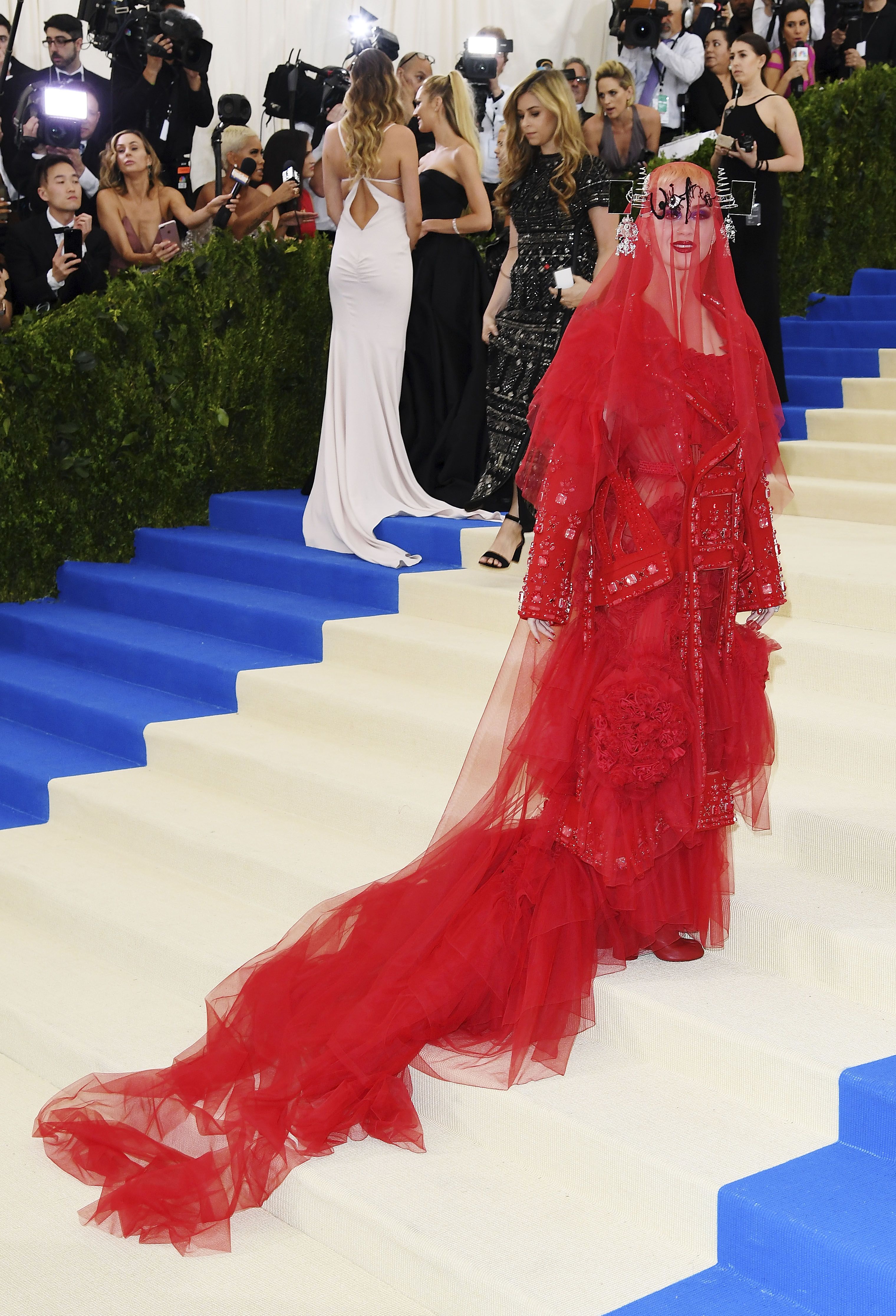 Katy Perry Turns Gothic Bride In Dramatic Red Veiled Gown At Met