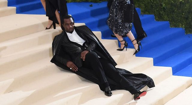 P Diddy lying down on Met Gala 2017 red carpet
