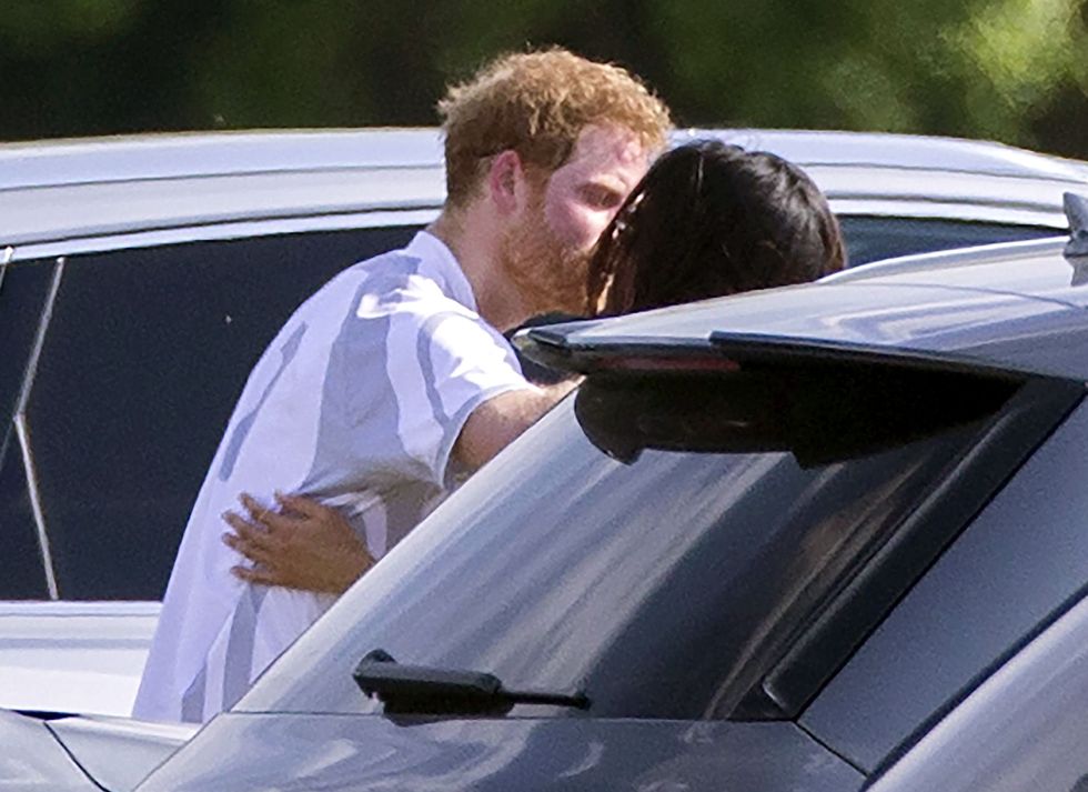Meghan Markle kissing Prince Harry at polo | ELLE UK