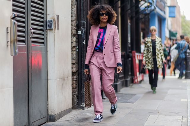woman street style in a pink suit 2017
