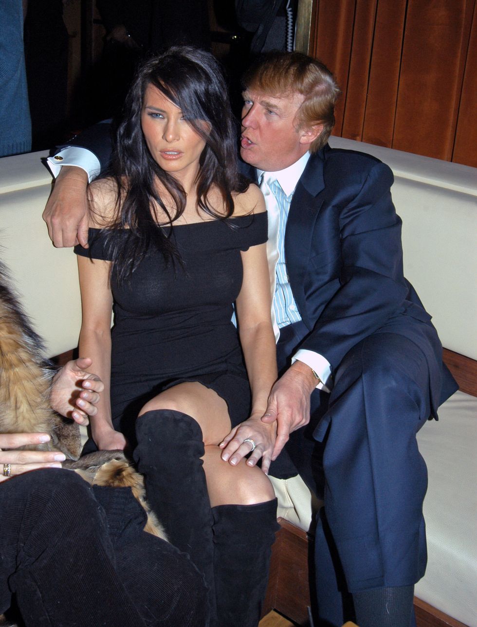 Donald Trump sits close to his girlfriend Melania Knaus at the Men's Health Magazine Bash for the 50th Birthday of Page Six Editor Richard Johnson held at Marquee