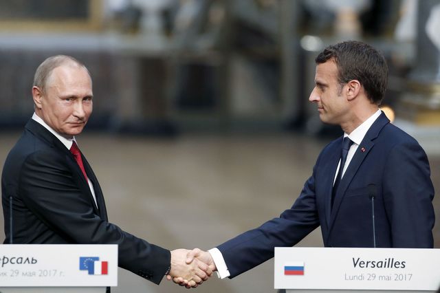 Emmanuel Macron and Vladimir Putin meeting for the first time in Versailles | ELLE UK