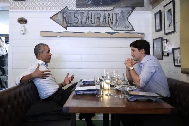 Obama and Trudeau having dinner