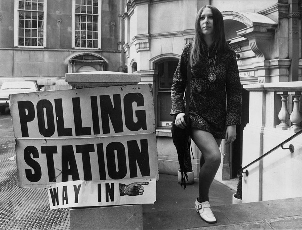 Eighteen year old Sharon Nathan in April 1970 leaving a London polling station during elections for the LCC (London County Council), which were the first elections in which eighteen year olds were able to vote following a change in the law.