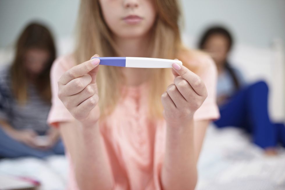 Teenager with positive pregnancy test