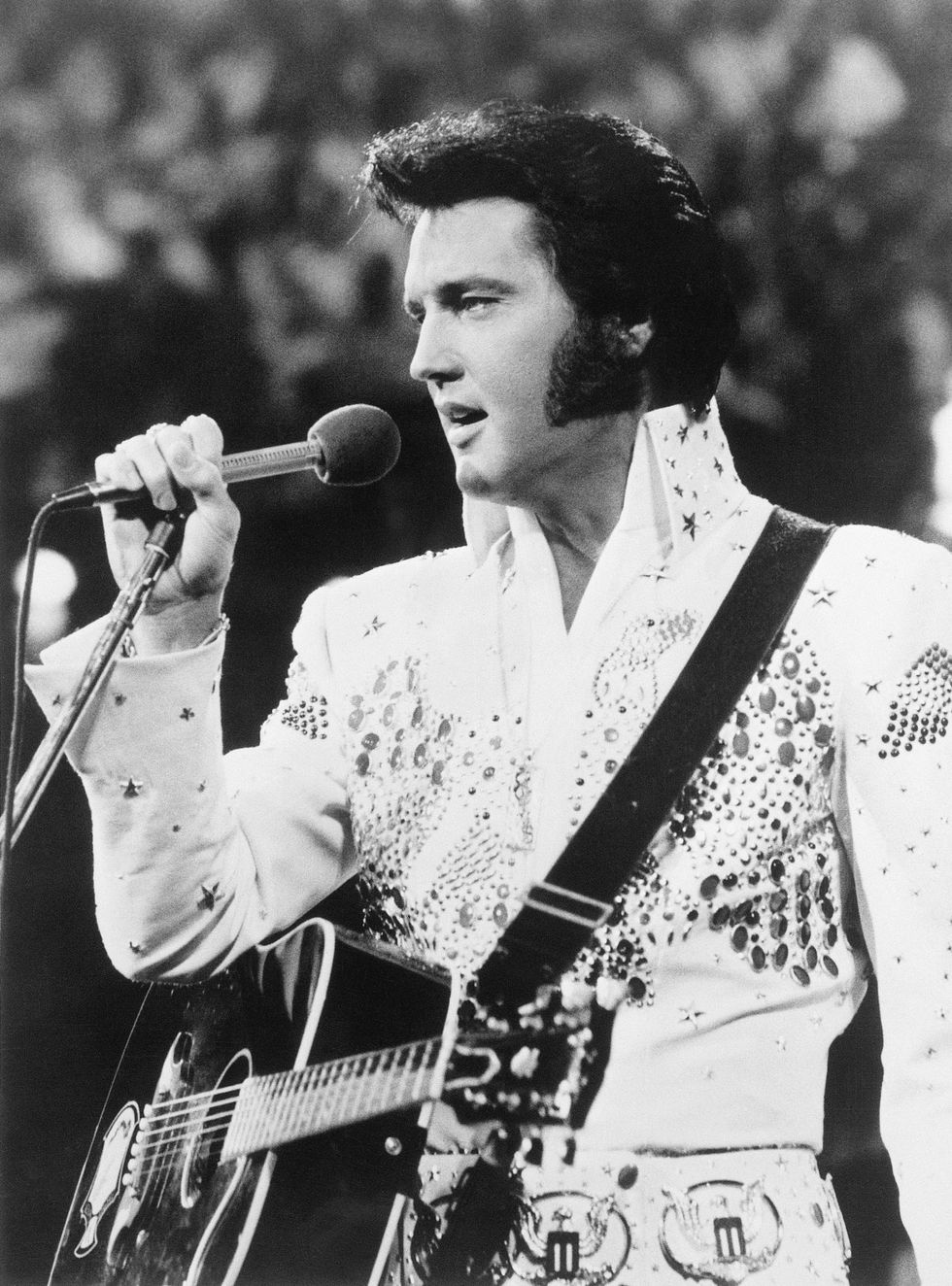 <p>"The King" performing in one of his signature, bejeweled costumes.</p>