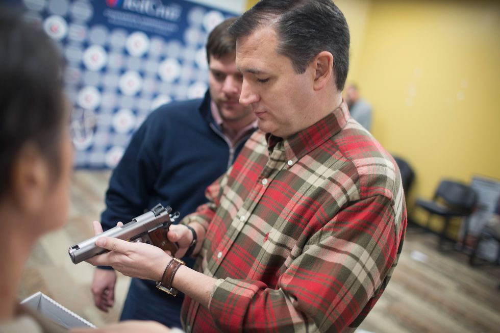 Ted Cruz holding a gun