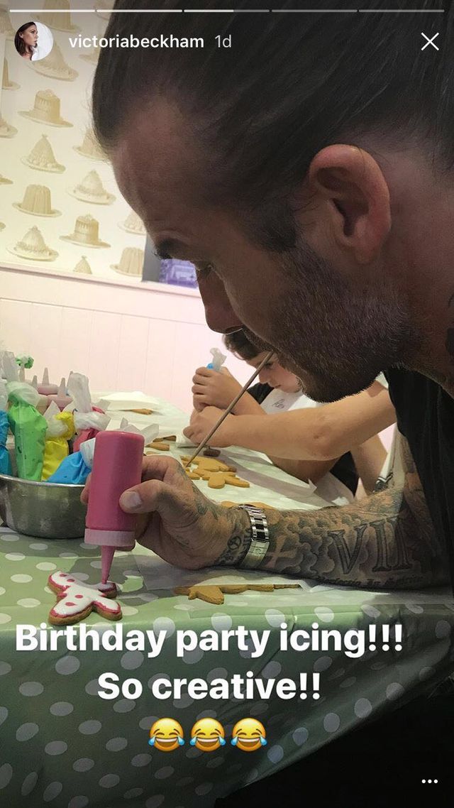 David Beckham icing biscuit at his daughter's birthday bash | ELLE UK