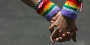 gay pride rainbow - two women holding hands