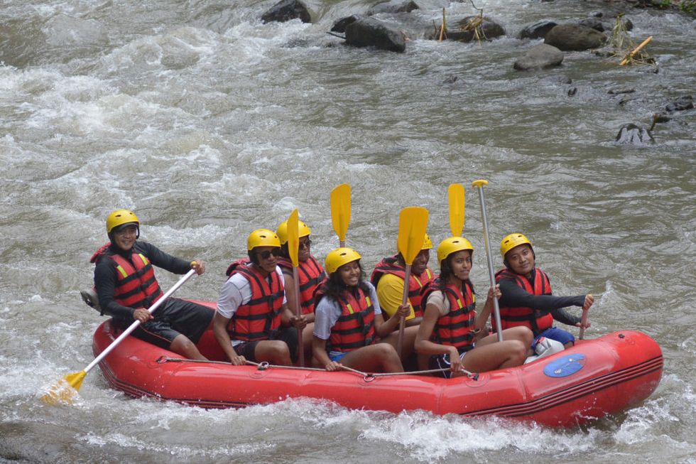 Barack Obama, Michelle, Malia and Sasha white water rafting in Indonesia