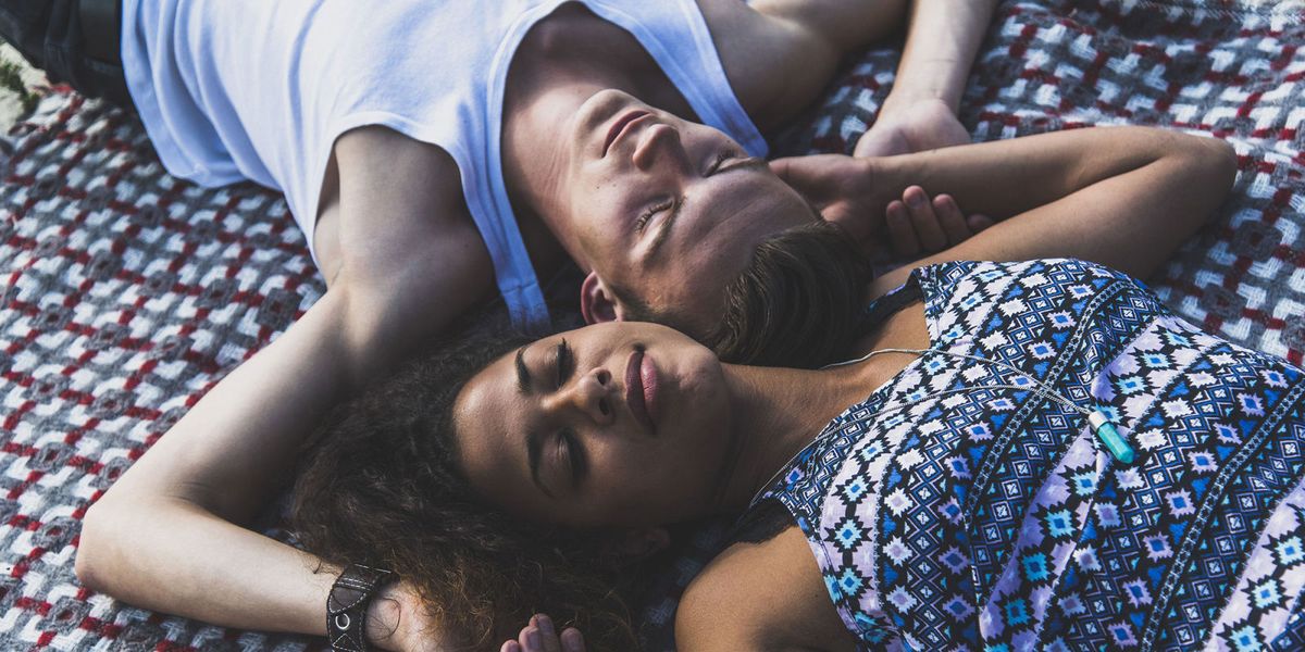 Why You Probably Sleep Better With Another Person In Bed
