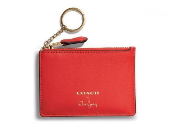 Red, Fashion accessory, Leather, Wallet, Keychain, Coin purse, Handbag, Bag, Pink, Material property, 