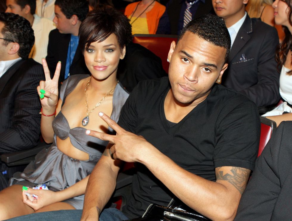 Rihanna and Chris Brown in the audience during the 2008 MTV Movie Awards at the Gibson Amphitheatre on June 1, 2008 in California | ELLE UK