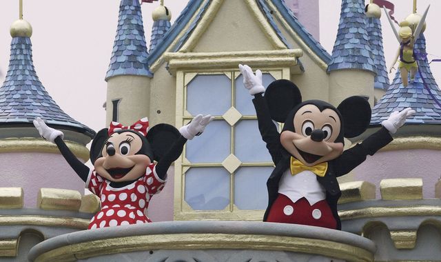 Disney characters Mickey Mouse and Minnie Mouse perform during the parade at Hong Kong Disneyland on September 11, 2005 in Hong Kong. The new theme park is scheduled to have its grand opening September 12 | ELLE UK