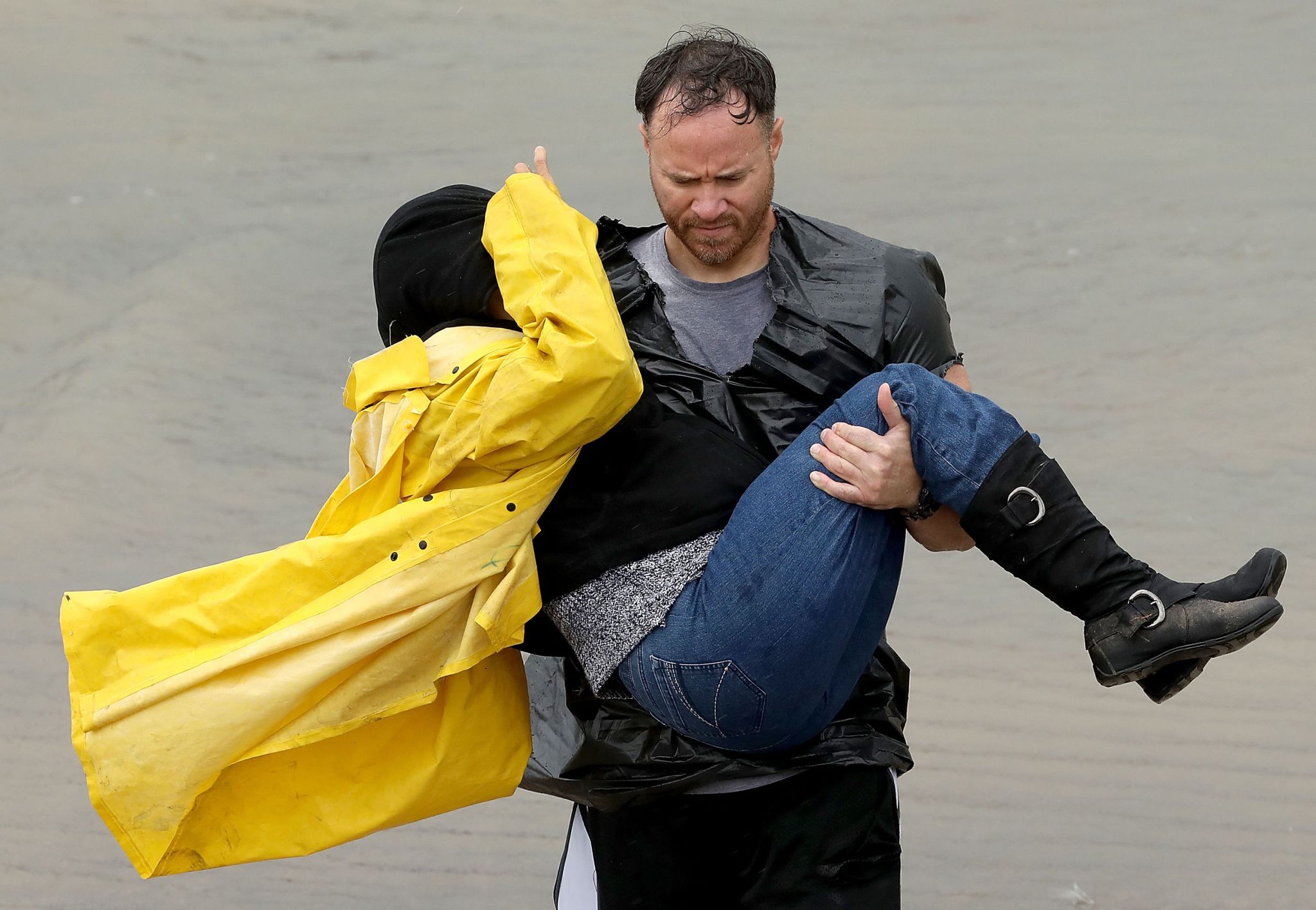Hurricane Harvey man carrying woman