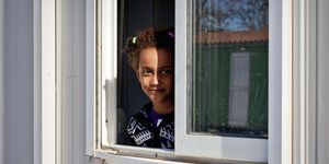 A Somali refugee girl guest of the Temporary accommodation centre for immigrants in Eleonas of Athens, 11 Febraury 2016 | ELLE UK