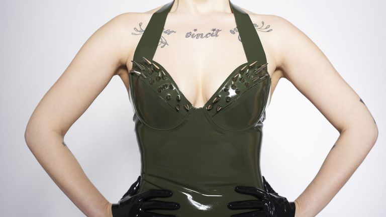 crop shot of woman in latex dress | ELLE UK