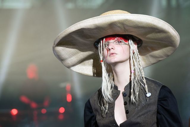 A model walks the runway during Louise Green Hats Spring/Summer News  Photo - Getty Images