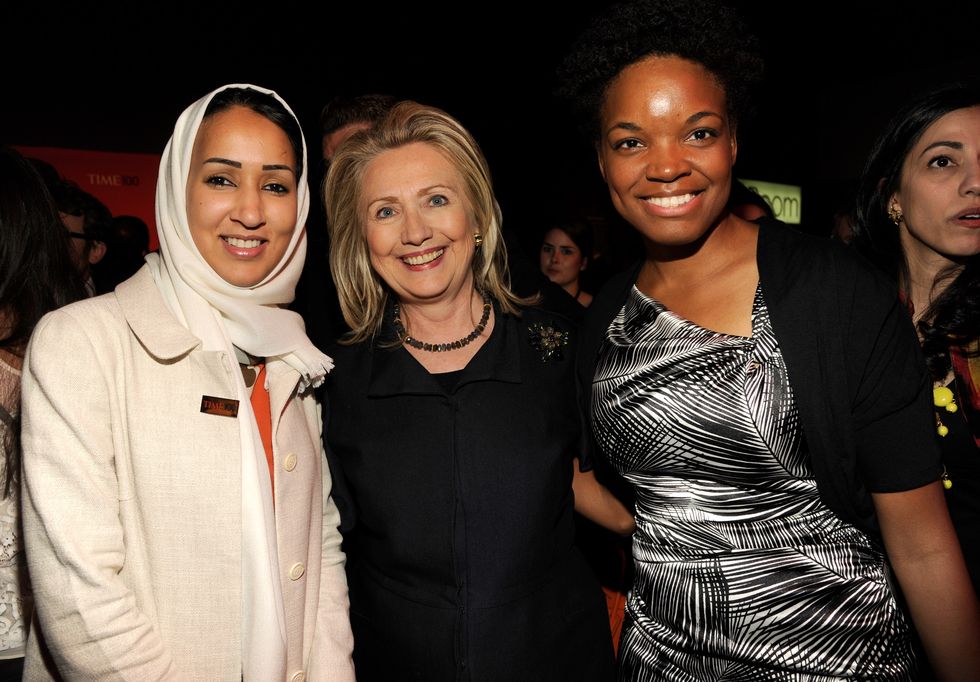 Manal al-Sharif and United States Secretary of State Hillary Clinton attend the TIME 100 Gala celebrating TIME'S 100 Most Infuential People In The World at Jazz at Lincoln Center on April 24, 2012 in New York City | ELLE UK