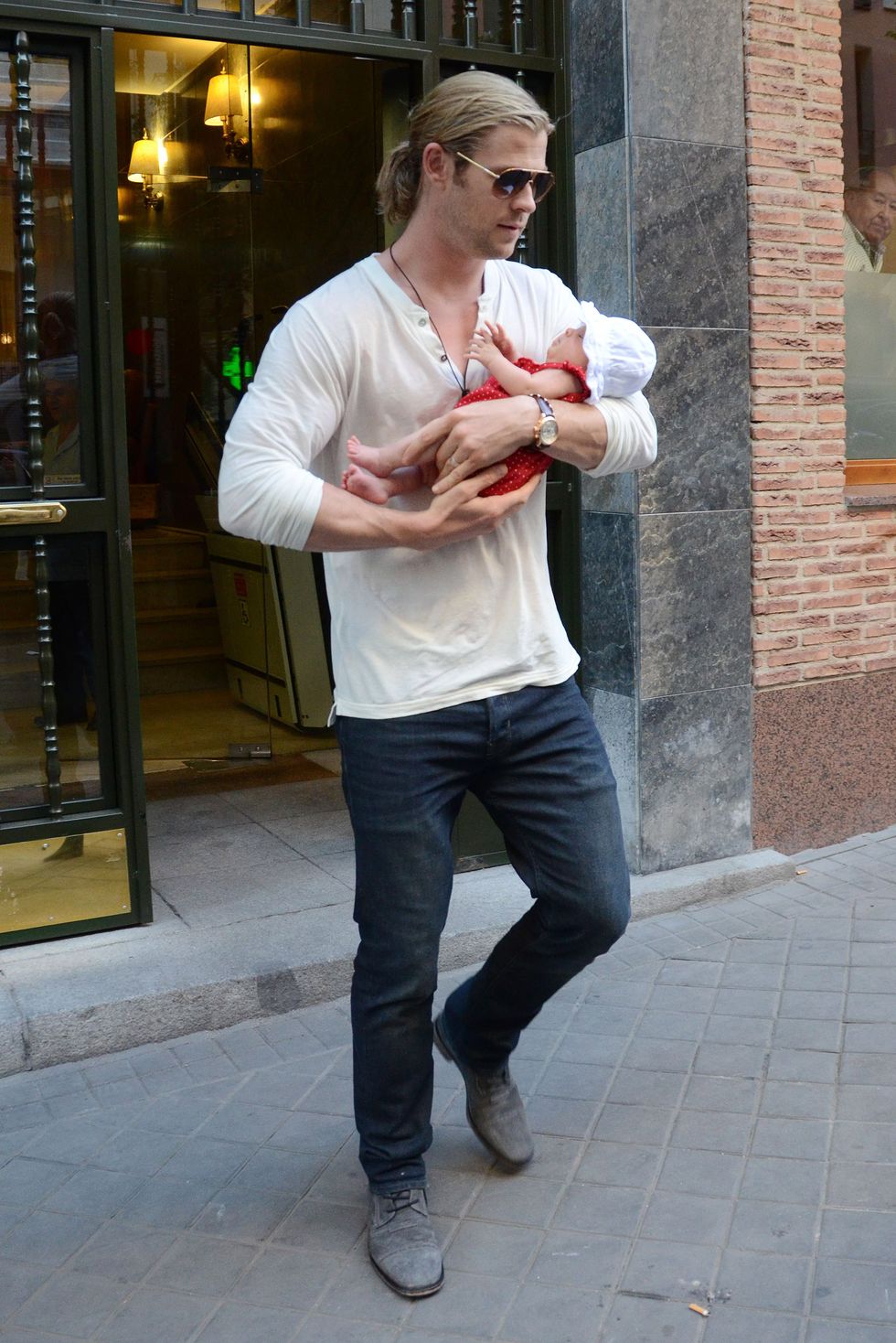 Chris Hemsworth holding baby
