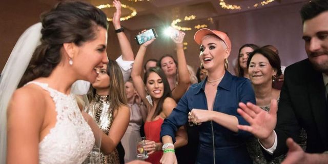 Check Out Katy Perry Crashing A Real-Life Wedding
