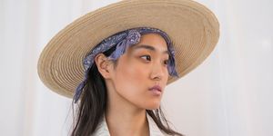 Lip, Hat, Skin, Chin, Jaw, Headgear, Fashion accessory, Organ, Costume accessory, Eyelash, 