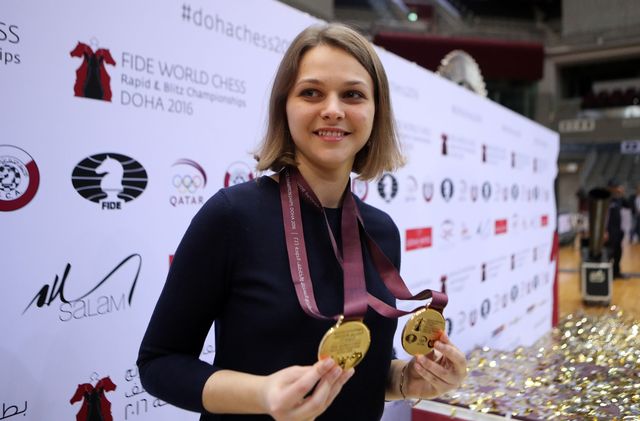 Ukraine's grandmaster Anna Muzychuk celebrates after winning a two gold medals in the FIDE World Chess Rapid & Blitz Championships 2016, in the Qatari capital Doha on December 30, 2016 | ELLE UK