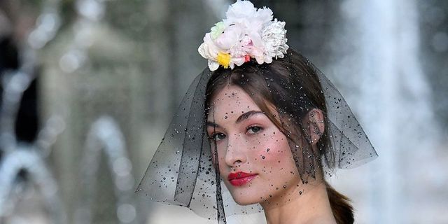 Lip, Hairstyle, Skin, Chin, Hair accessory, Fashion accessory, Headpiece, Headgear, Beauty, Petal, 