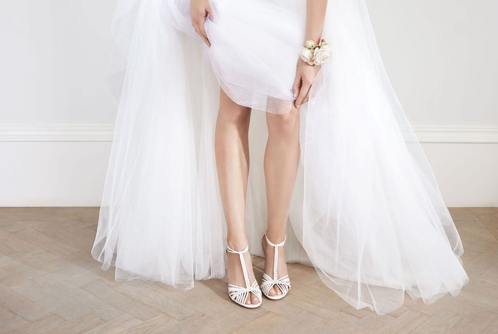 Clothing, Floor, Shoe, Bridal accessory, Photograph, Joint, Wedding dress, White, Bridal clothing, Dress, 