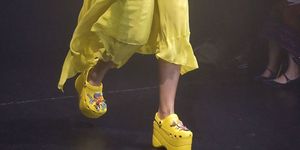 Footwear, Yellow, Human leg, Fashion, Foot, Tan, One-piece garment, Calf, Sandal, Ankle, 