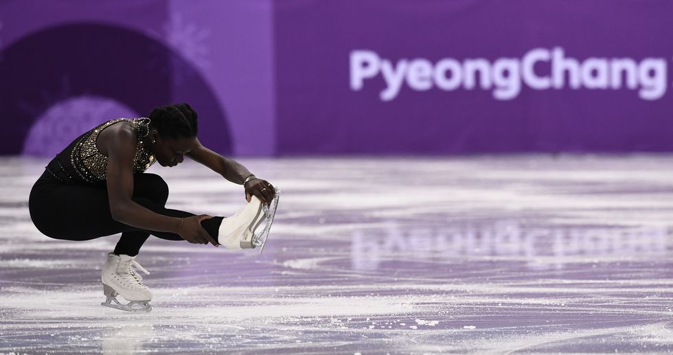 Ice skate, Human leg, Purple, Knee, Figure skating, Figure skate, Magenta, Thigh, Violet, Ice dancing, 