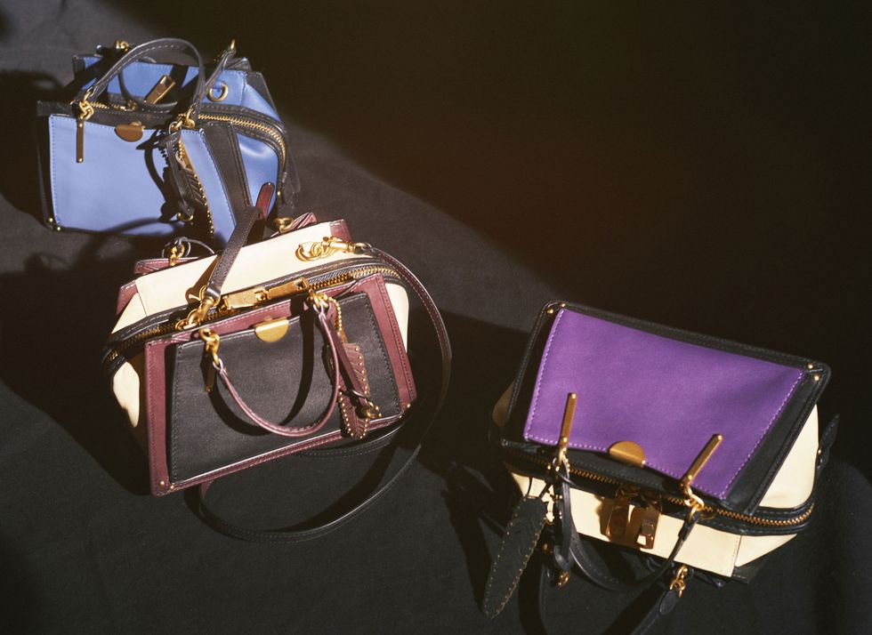 Purple, Bag, Lavender, Shoulder bag, Still life photography, Musical instrument accessory, Brass, Strap, Baggage, Leather, 