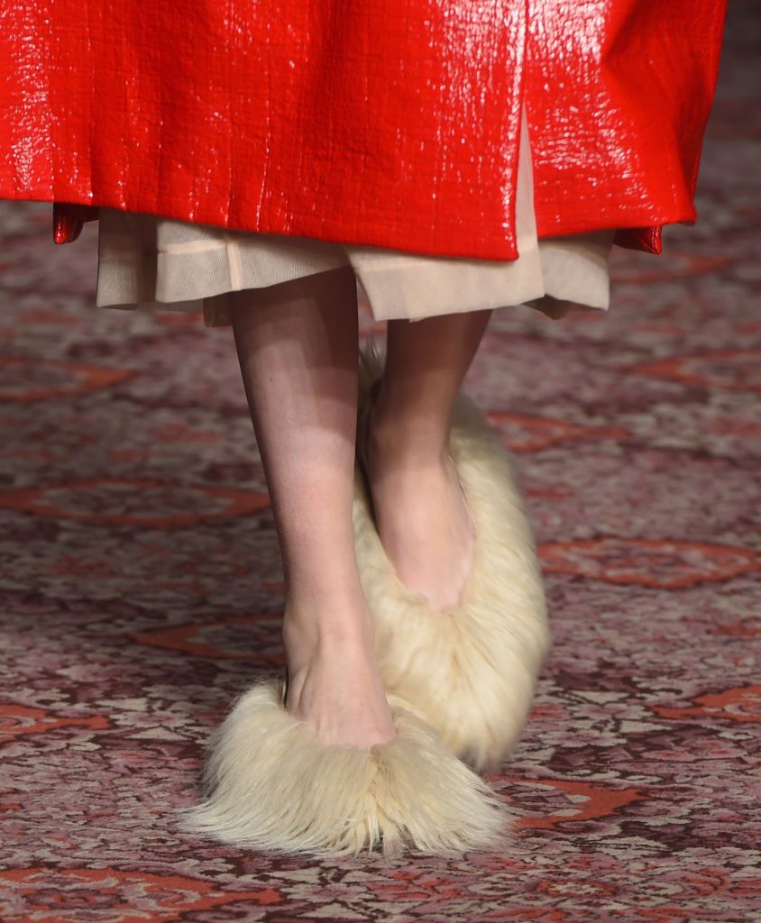 Human leg, Textile, Red, Carmine, Foot, Fur, Toe, Natural material, Coquelicot, Ankle, 