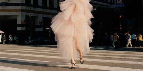 High heels, Pedestrian crossing, Street, Fashion, Street fashion, Sandal, Zebra crossing, Costume, Pedestrian, Feather, 
