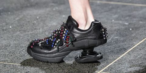 Footwear, Human leg, Fashion, Black, Grey, Silver, Fashion design, Walking shoe, Synthetic rubber, Work boots, 