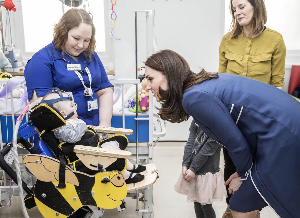 Catherine, Duchess of Cambridge with Amara Kedwell-Parsons, Lauren Kedwell and a nurse